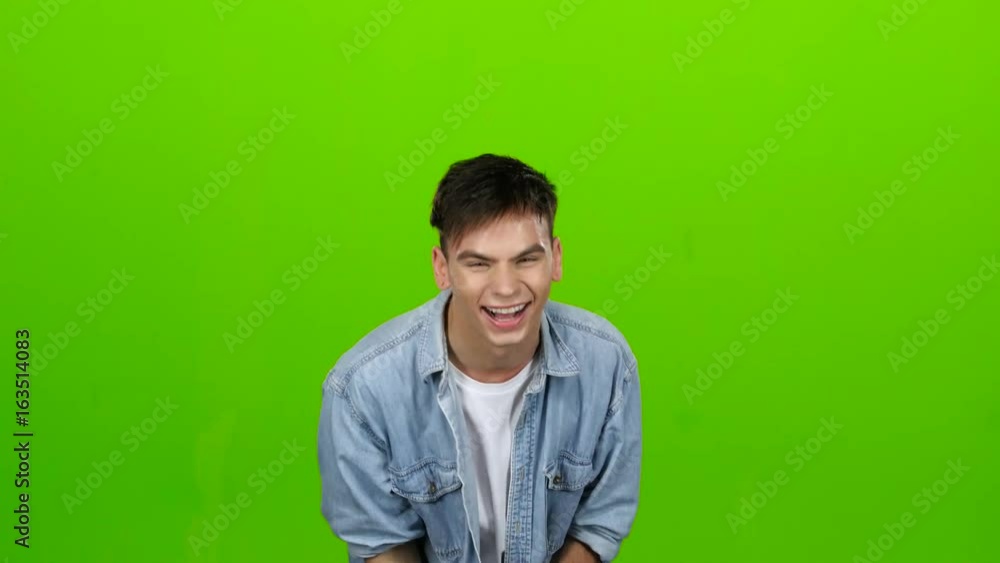 Guy jokes, he is not bored, he is happy and positive. Green screen Guy jokes, he is not bored, he is happy and positive. Green screen
