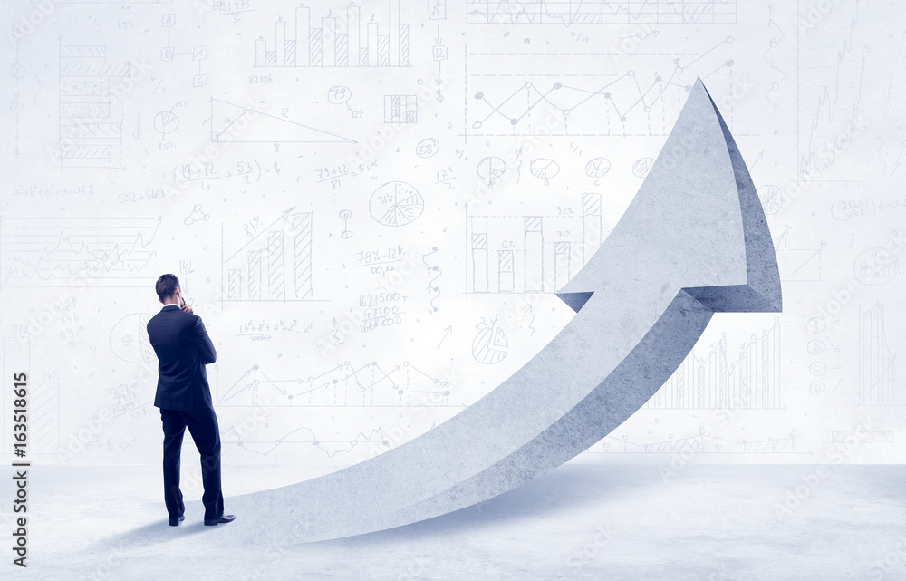 Obraz premium Financial businessman with arrow concept