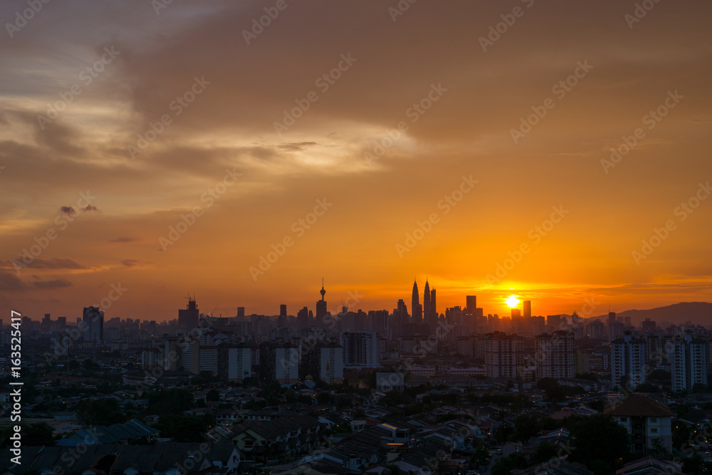 View of majestic sunset over downtown Kuala Lumpur, Malaysia View of majestic sunset over downtown Kuala Lumpur, Malaysia