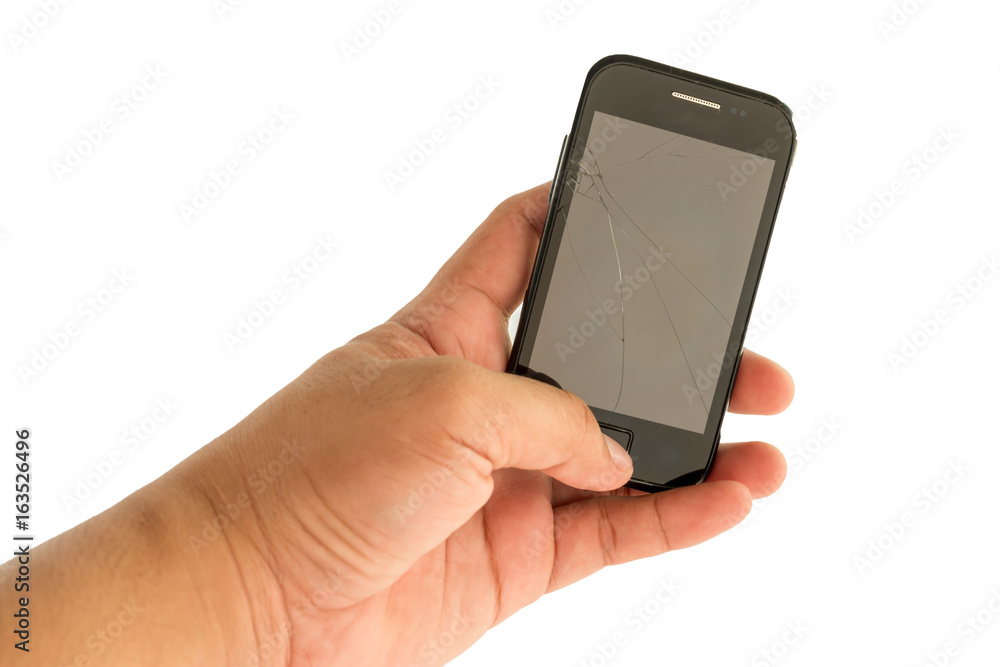 Hand holding a mobile with broken screen. Hand holding a mobile with broken screen.