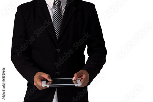 The business young man wearing suit handsome holding tablet on isolated white background.