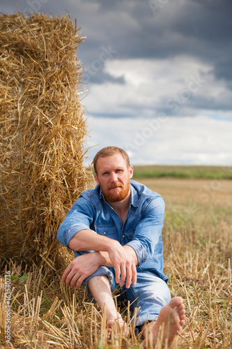 man on   field at harvest time. © DariaTrofimova
