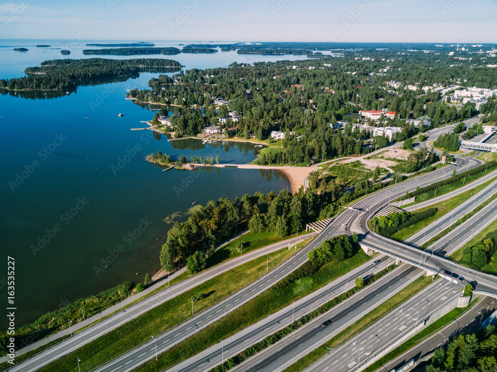 Aerial shot of highway interchange near the sea