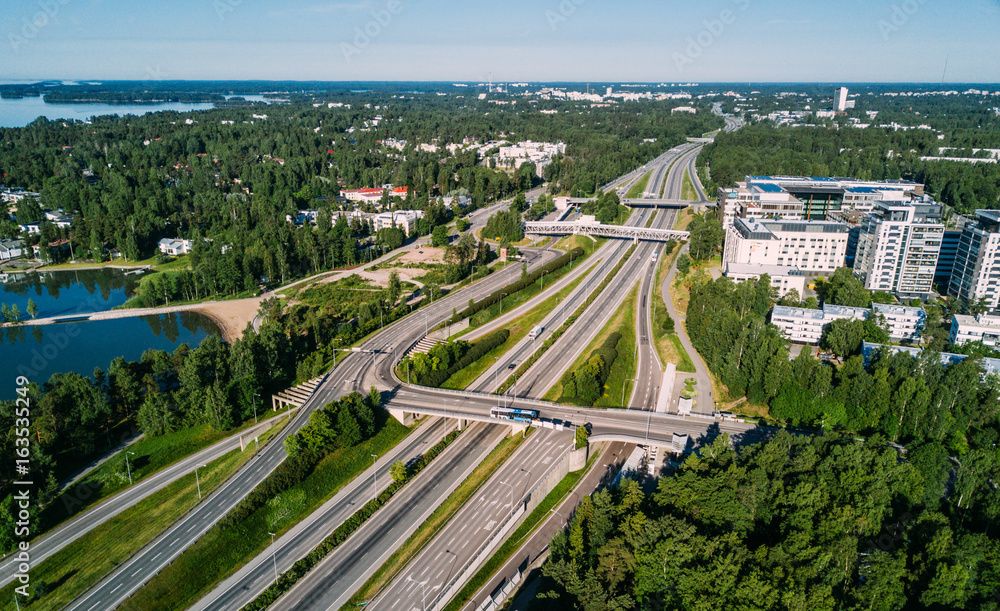 Aerial shot of highway interchange near the sea