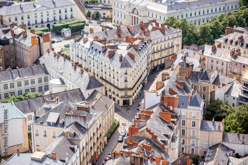 Aerial cityscape view with beautiful buildings in Nantes city during the sunny weather in France