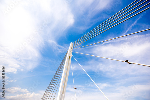 View on the modern bridge with beautiful sky in Nantes city in France © rh2010