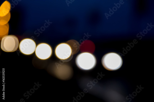 Bokeh blurred car lights at the night © olyasolodenko