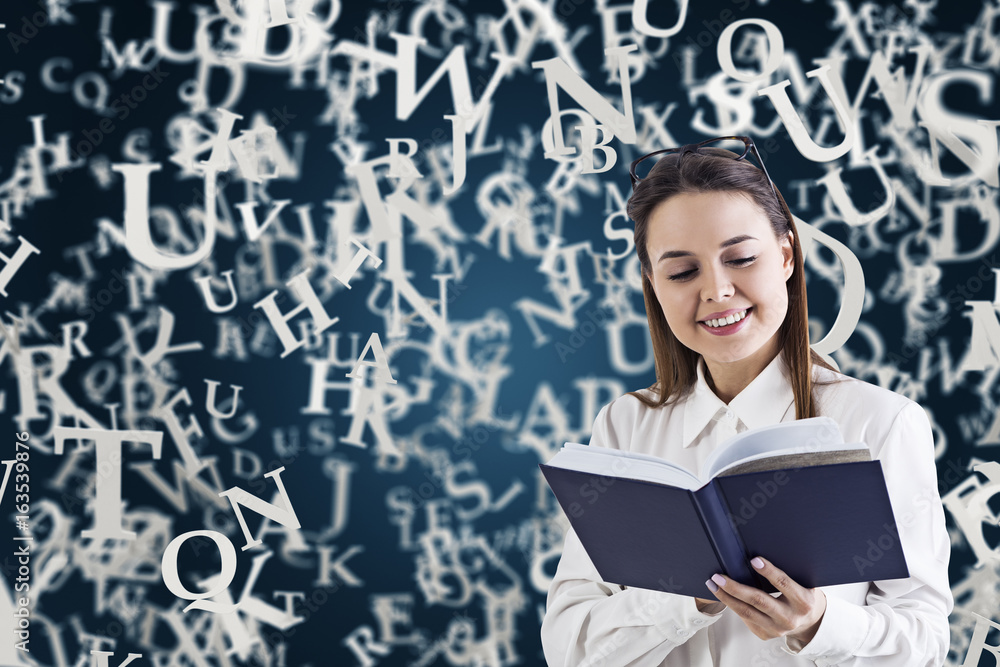 Smiling woman with a book, letters, blue Smiling woman with a book, letters, blue