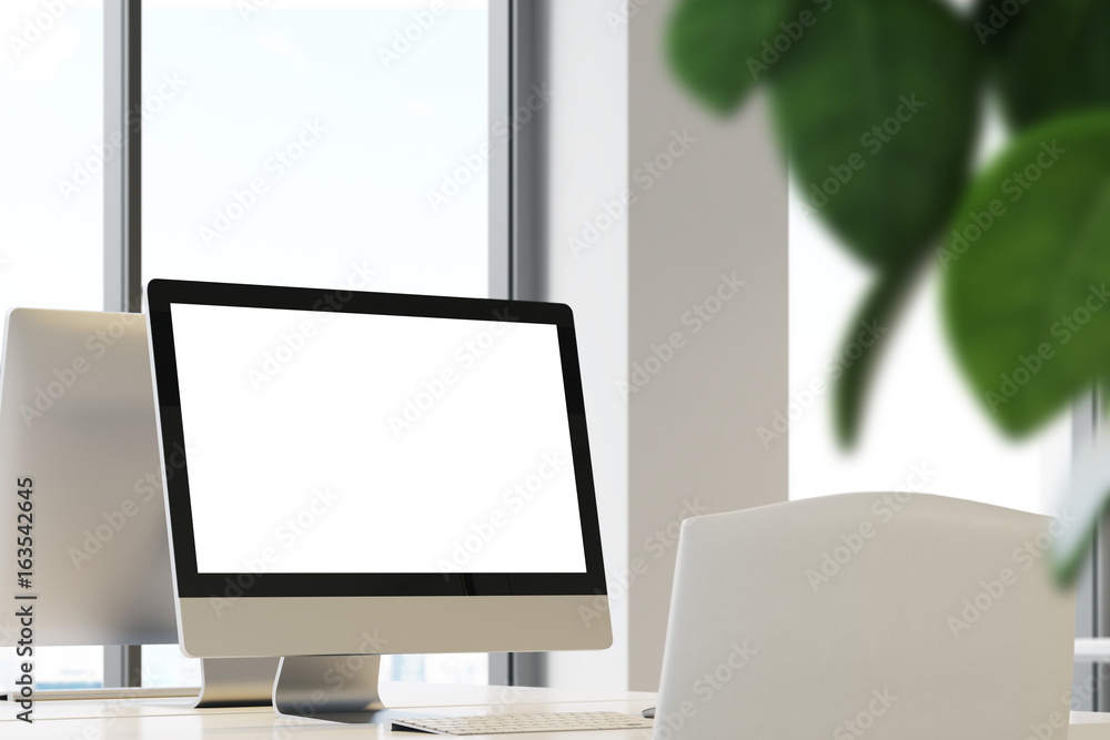 Blank computer screen in office Blank computer screen in office
