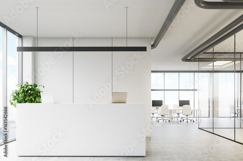 White office with a reception desk © ImageFlow