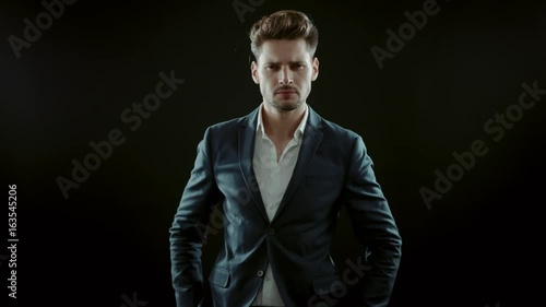 Handsome young businessman slow motion