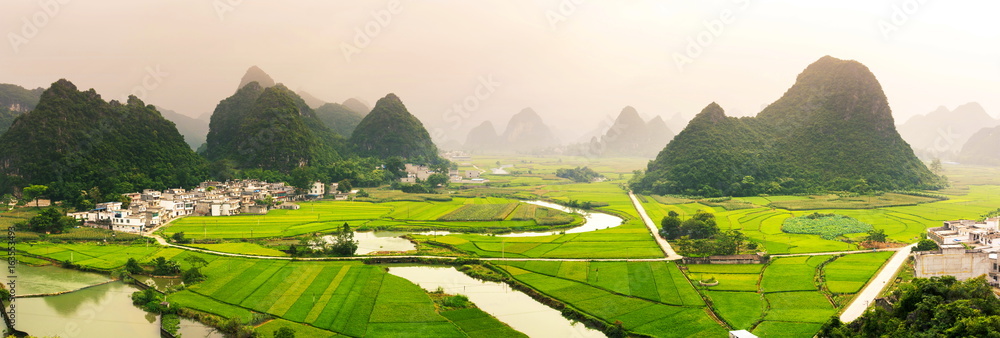 Stunning rice field view with karst formations China - obrazy, fototapety, plakaty 