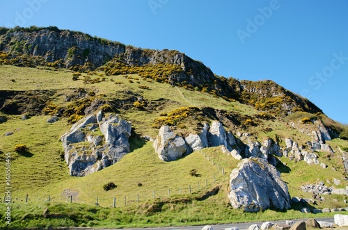 View over the headland Torr Head with its rugged coast over the Mull of Kintyre in the County Antrim in Northern Ireland, UK photo