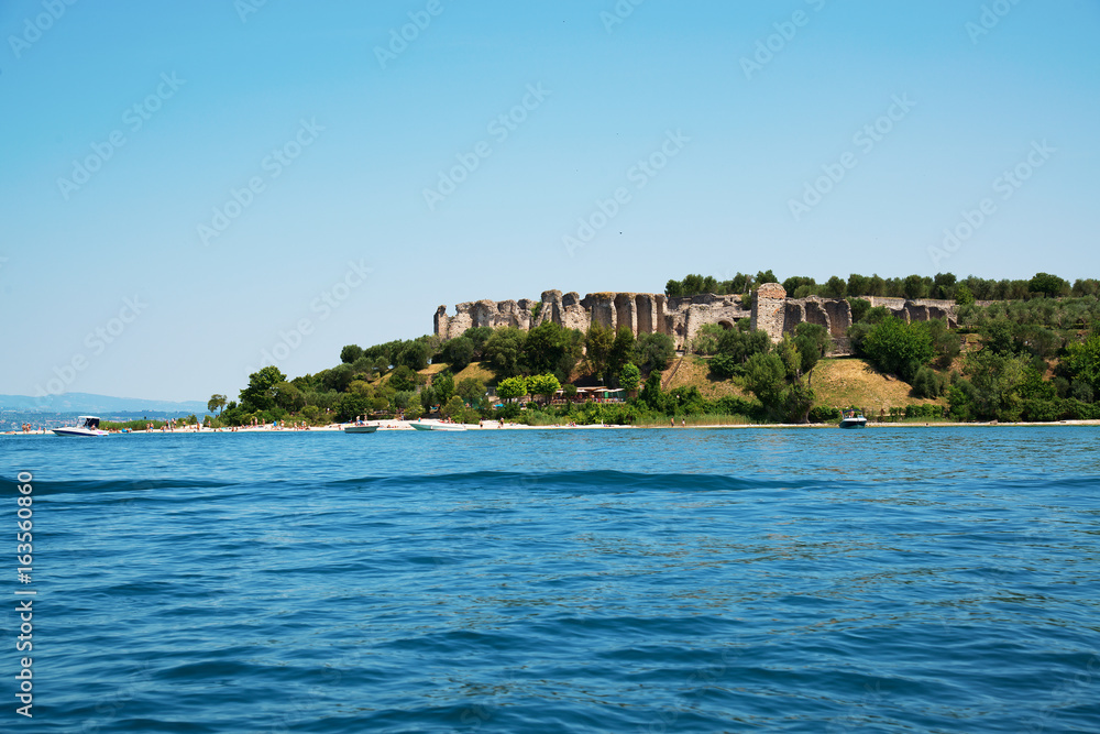 Naklejka premium Sirmione, Lake Garda. Italy. view on ruins of Grotto of Catullus,Roman private edifice, June 19, 2017