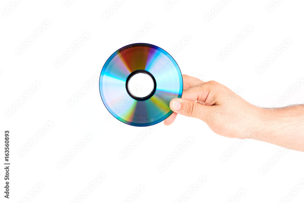 Hand Holding CD/DVD Disc Isolated On White Background Hand Holding CD/DVD Disc Isolated On White Background