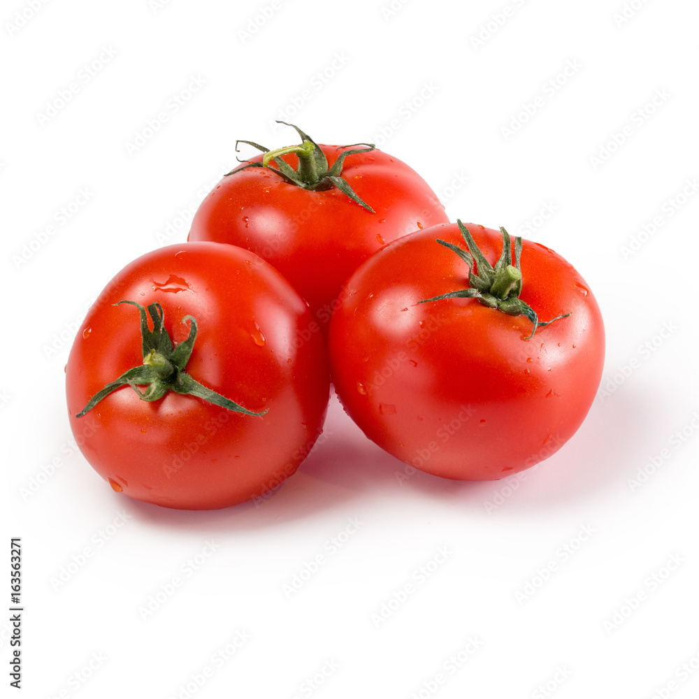 Red fresh tomatoes on a white isolated background Red fresh tomatoes on a white isolated background