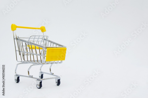 Empty Shopping Cart Over White Background