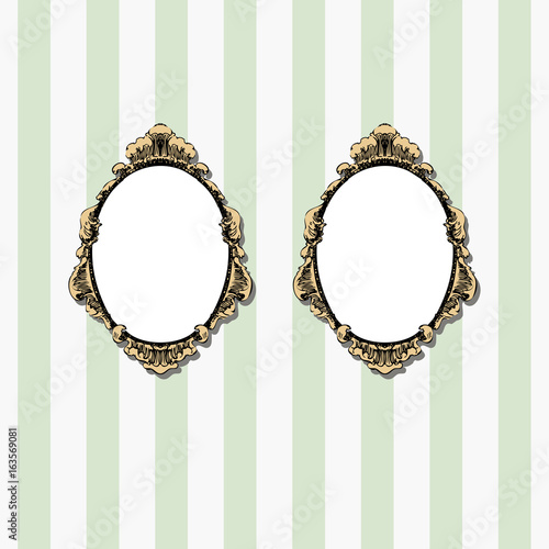 Two retro oval frames hanging on the wall.