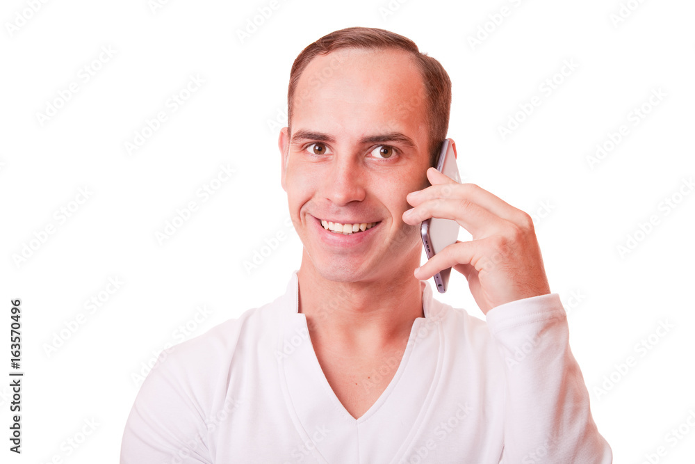 portrait of young man talking on mobile phone on white background. portrait of young man talking on mobile phone on white background.