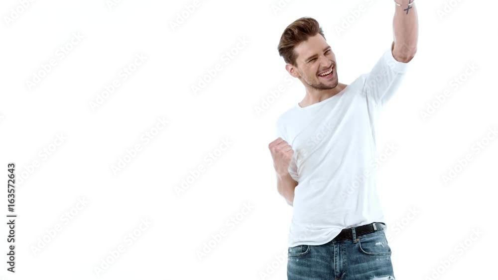 Handsome young man posing on white background - isolated Handsome young man posing on white background - isolated