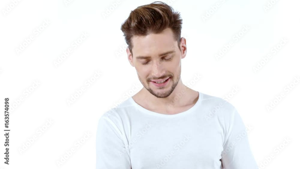 Handsome young man posing on white background - isolated Handsome young man posing on white background - isolated