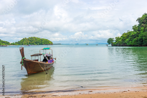 View of Thai wooden boat and scenic landscape, Thailand