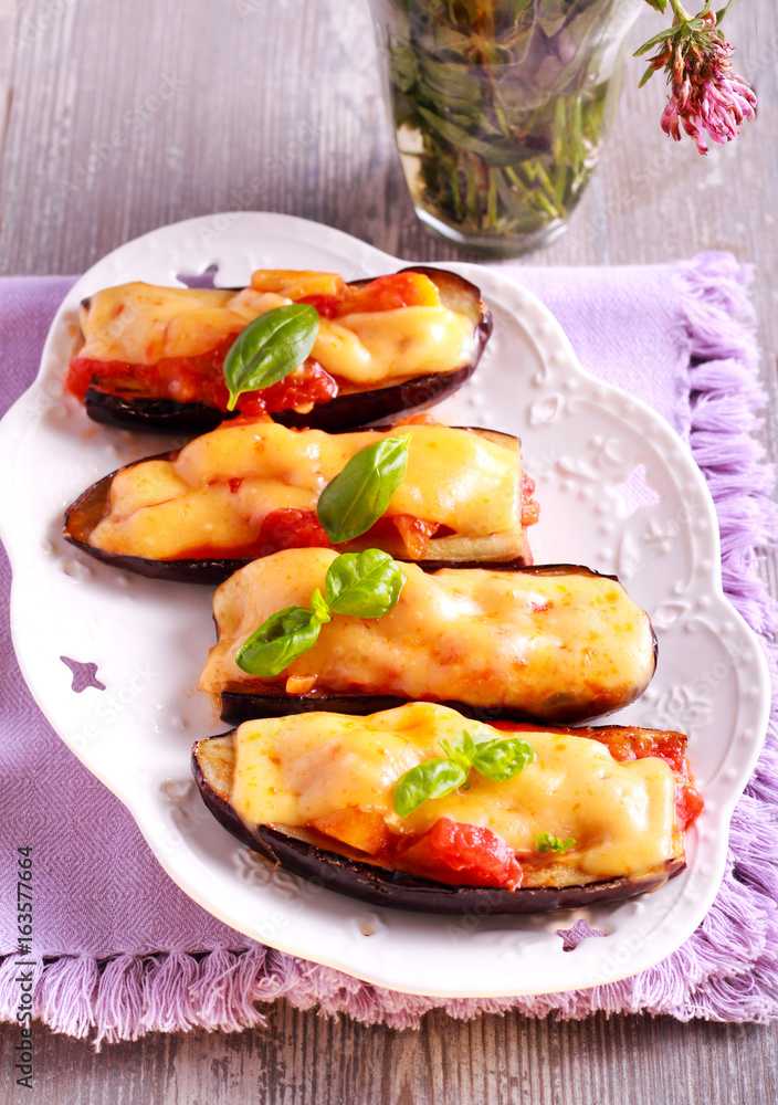 Stuffed eggplants with cheese topping Stuffed eggplants with cheese topping