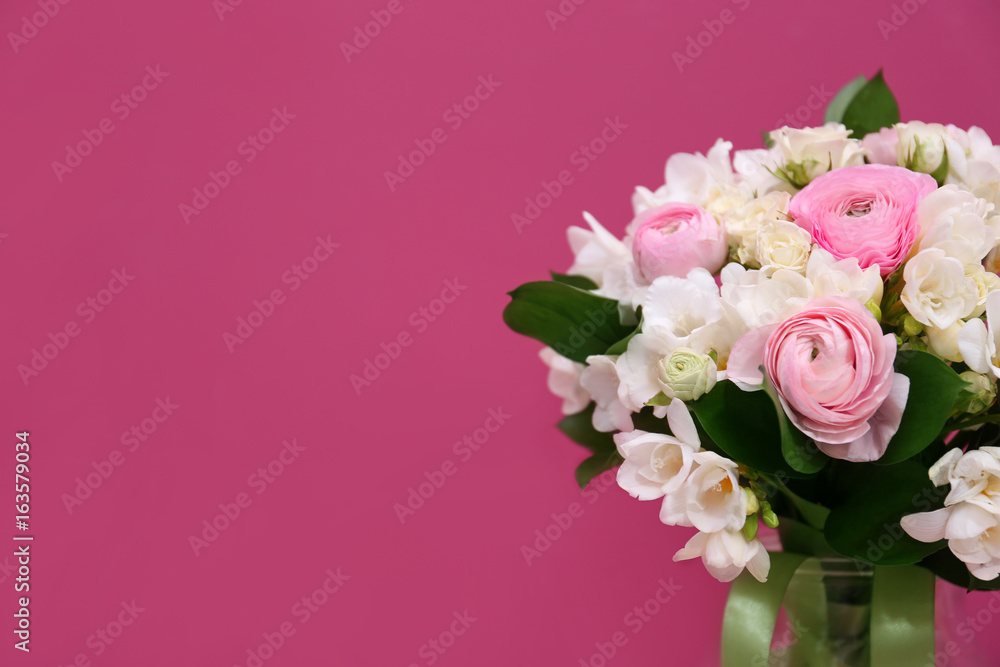 Beautiful bouquet with white freesia on color background Beautiful bouquet with white freesia on color background