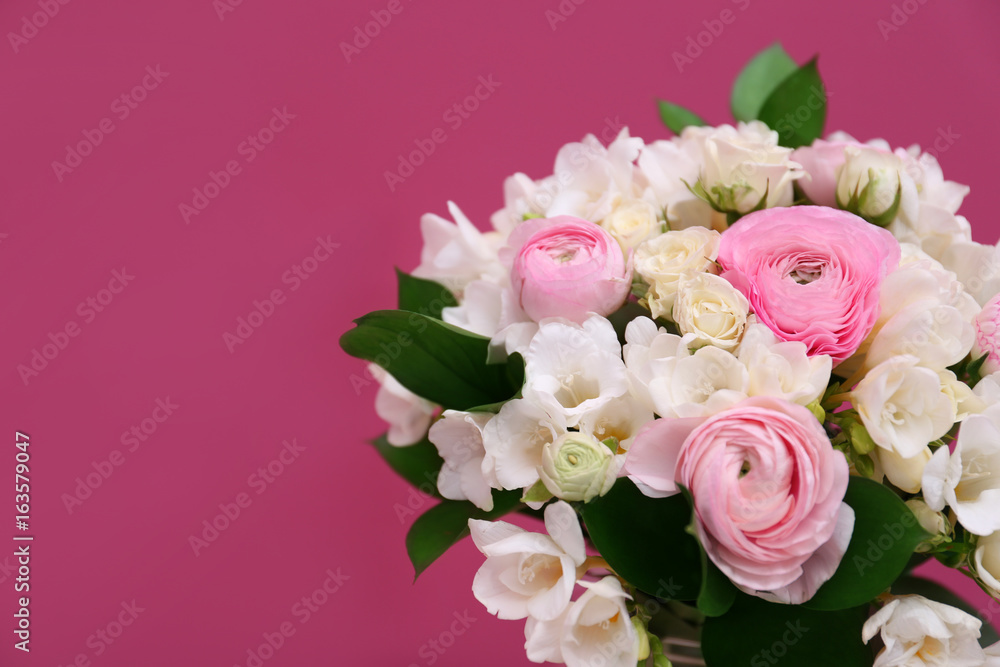 Beautiful bouquet with white freesia on color background Beautiful bouquet with white freesia on color background