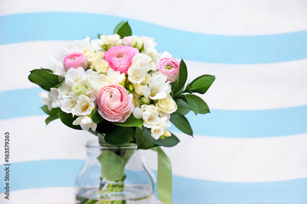 Obraz premium Beautiful bouquet with white freesia on color background