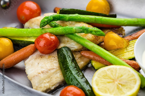 Grilled fish and vegetables with sauce