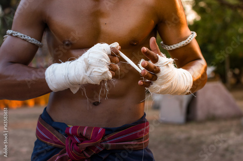 The man Thai boxing,Thai boxing vintage style,Thailand. photo