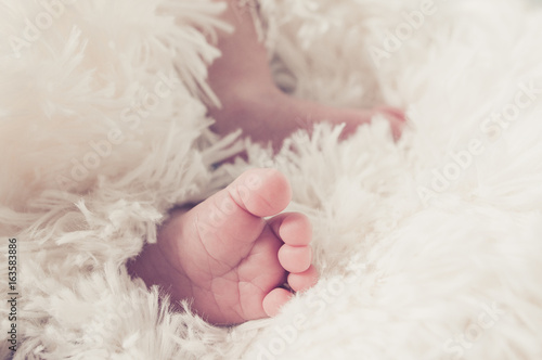 Tiny newborn's foot