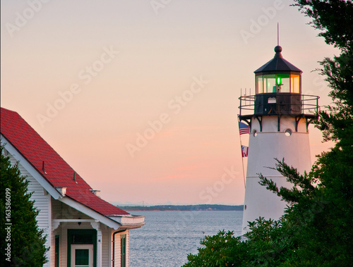 Foto Sunset over Warwick Harbor Lighthouse in Rhode Island