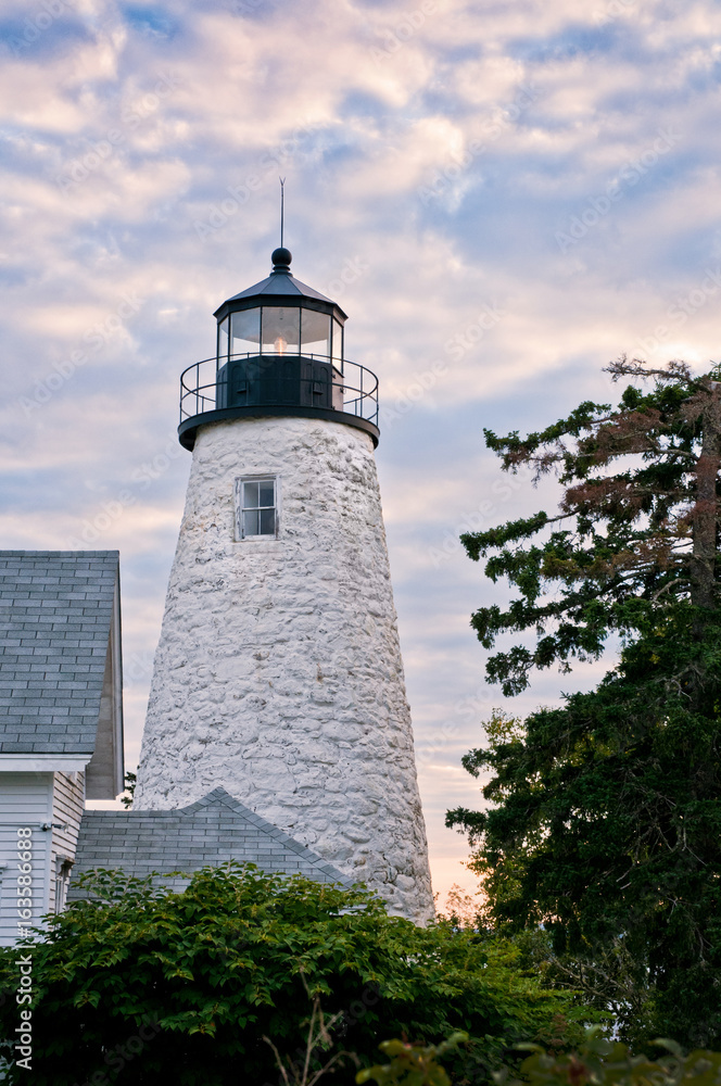 Sunset over Dice Head lighthouse in Castine, Maine, a famous area where many wars were fought for control of this strategic military region.