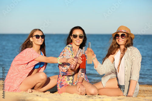 Beautiful young women in be...