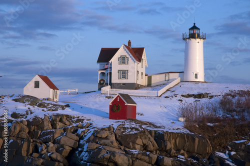 Snow Covered Lighthouse In Maine During Holidays photo