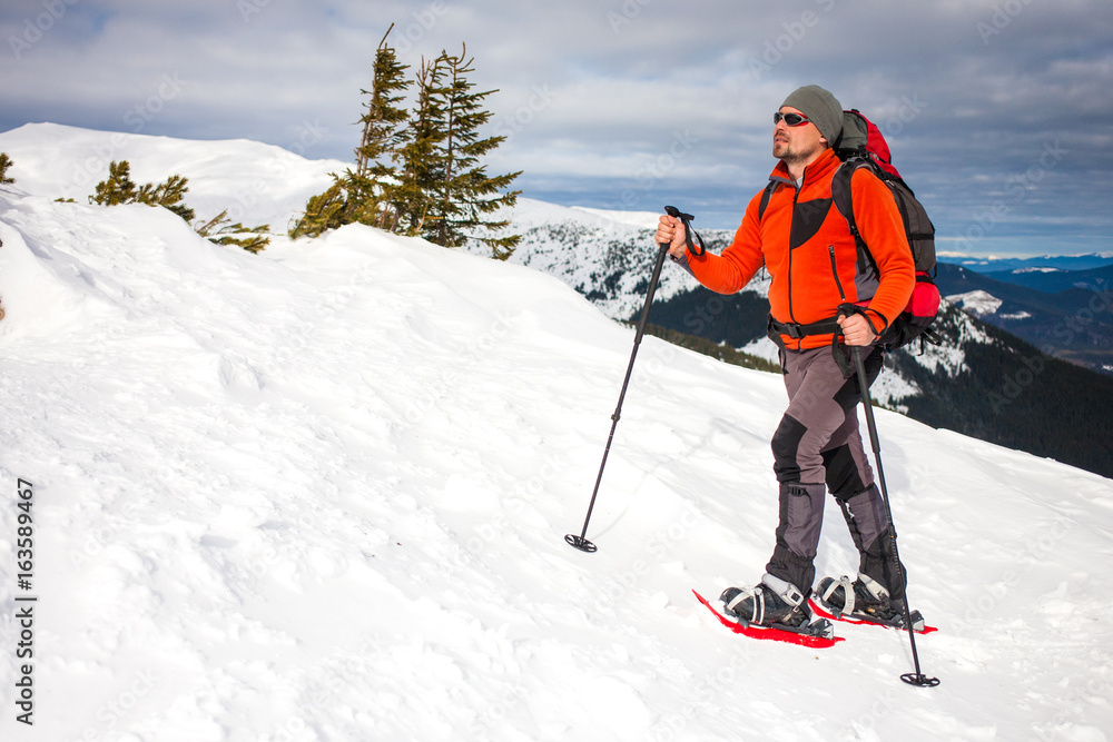 Climber is in the mountains.