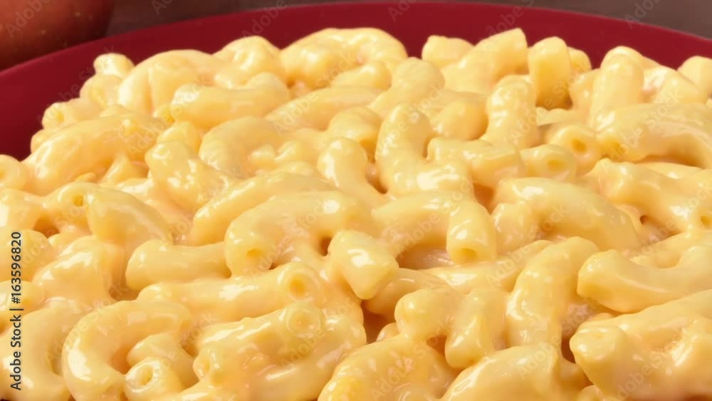 Dolly out from a plate of macaroni and cheese to schoolbooks
Dolly out from a plate of macaroni and cheese to schoolbooks
