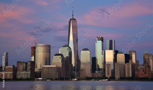 The Freedom Tower, World Financial Center, and the skyline of downtown Manhattan from Jersey City at sunset.