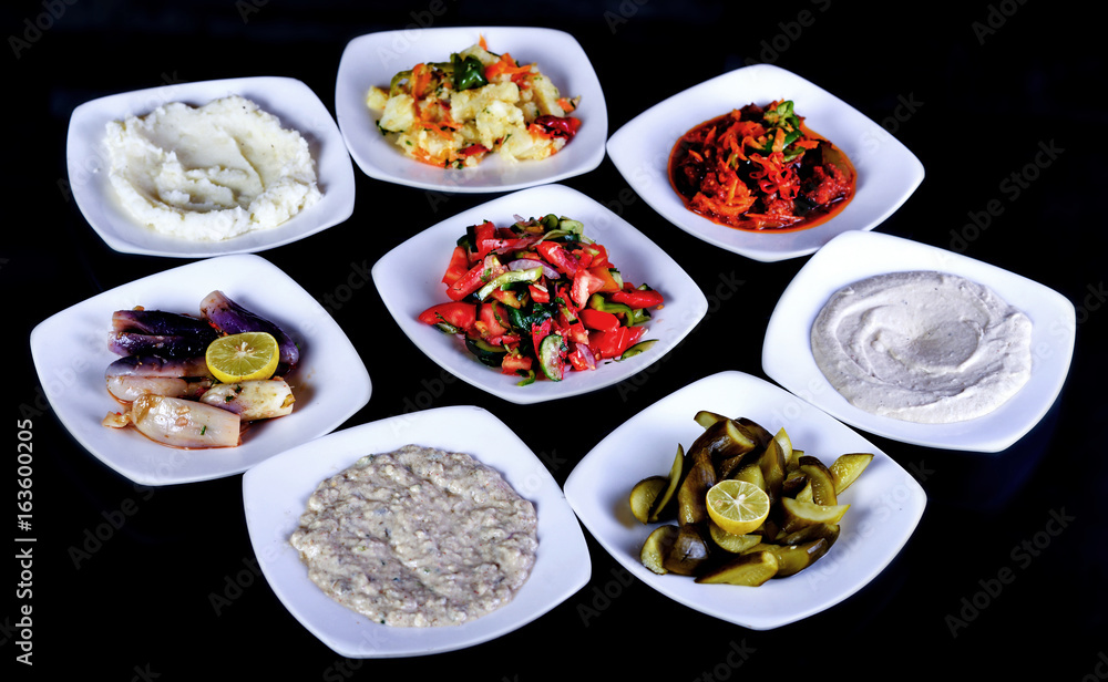 Meals of chicks, meat, shish tawook, rice and appetizers , grilled Meals of chicks, meat, shish tawook, rice and appetizers , grilled