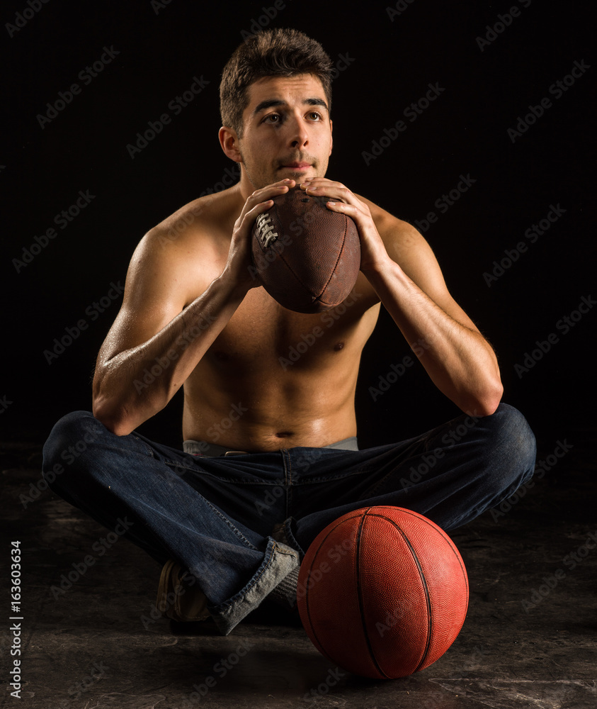 College Student Holding Football College Student Holding Football
