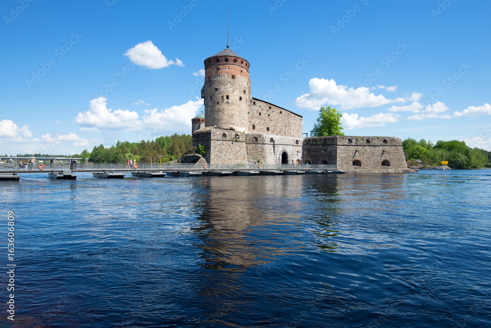 View of the Olavinlinna fortress o from the water area of Pihlajavesi lake. Savonlinna, Finland