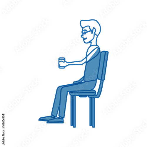 young man employee sitting with coffee cup time break