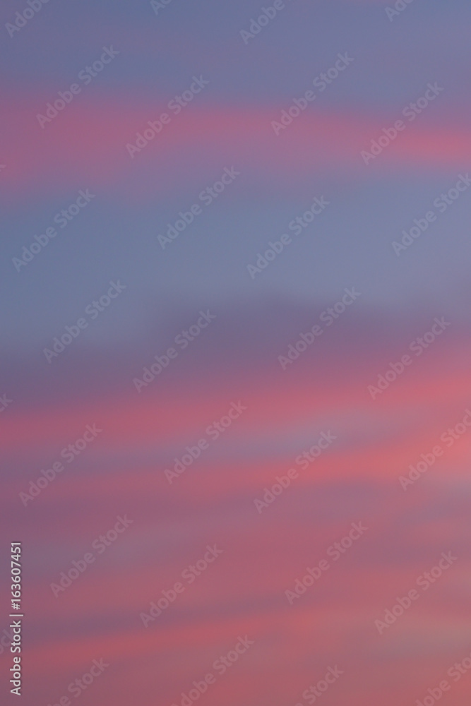 Blur background texture of colorful sunset clouds in vertical frame
