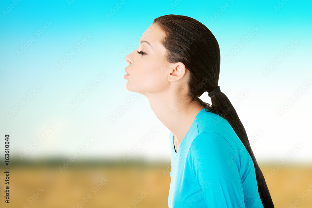 beautiful casual woman sending a kiss. beautiful casual woman sending a kiss.