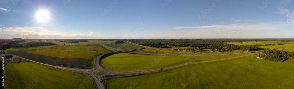 Aerial photography. Intersection with cars from above. Panorama.