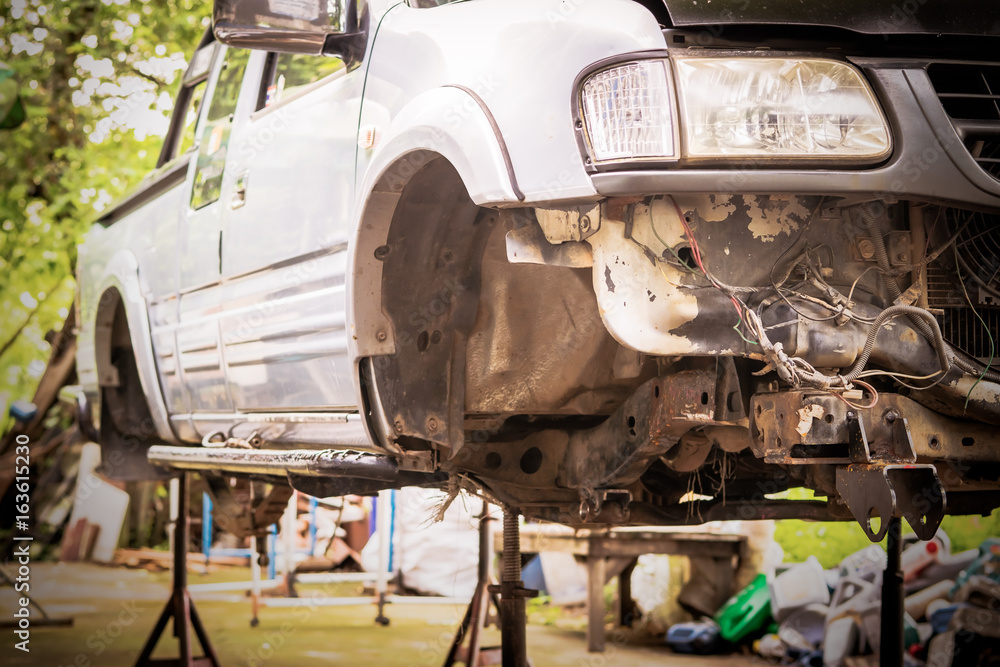custom made wallpaper toronto digitalPickup truck removing wheels to repair the suspension and replacement parts.