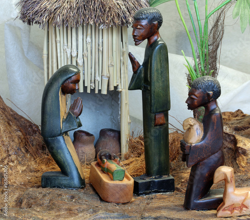 Bild auf Leinwand Nativity scene with the holy family from Angola in African style