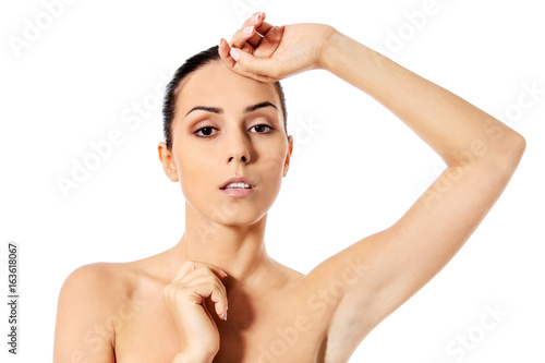 Beautiful woman face close up studio. Isolated on white.